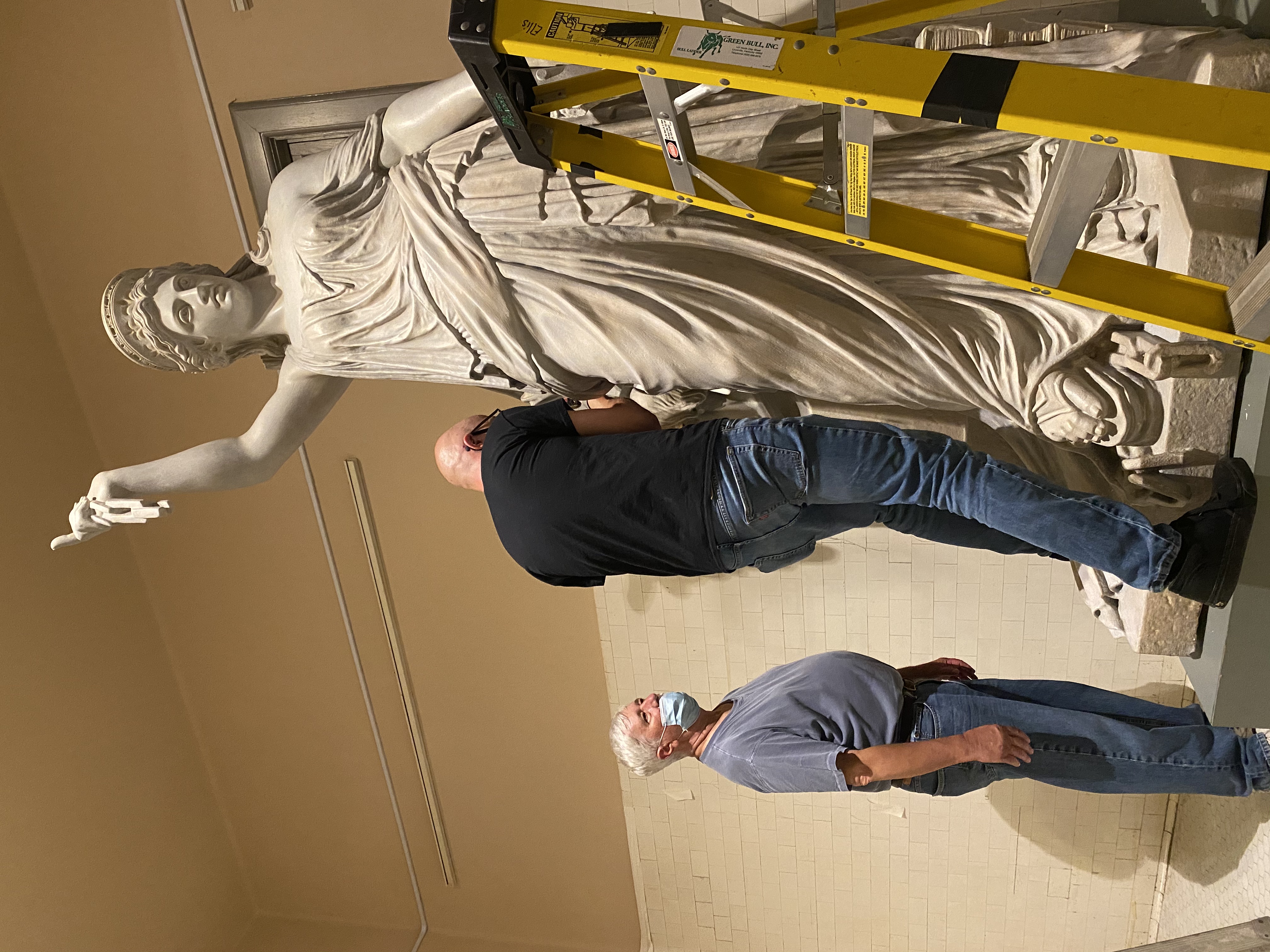 The masked team during the COVID de-installation