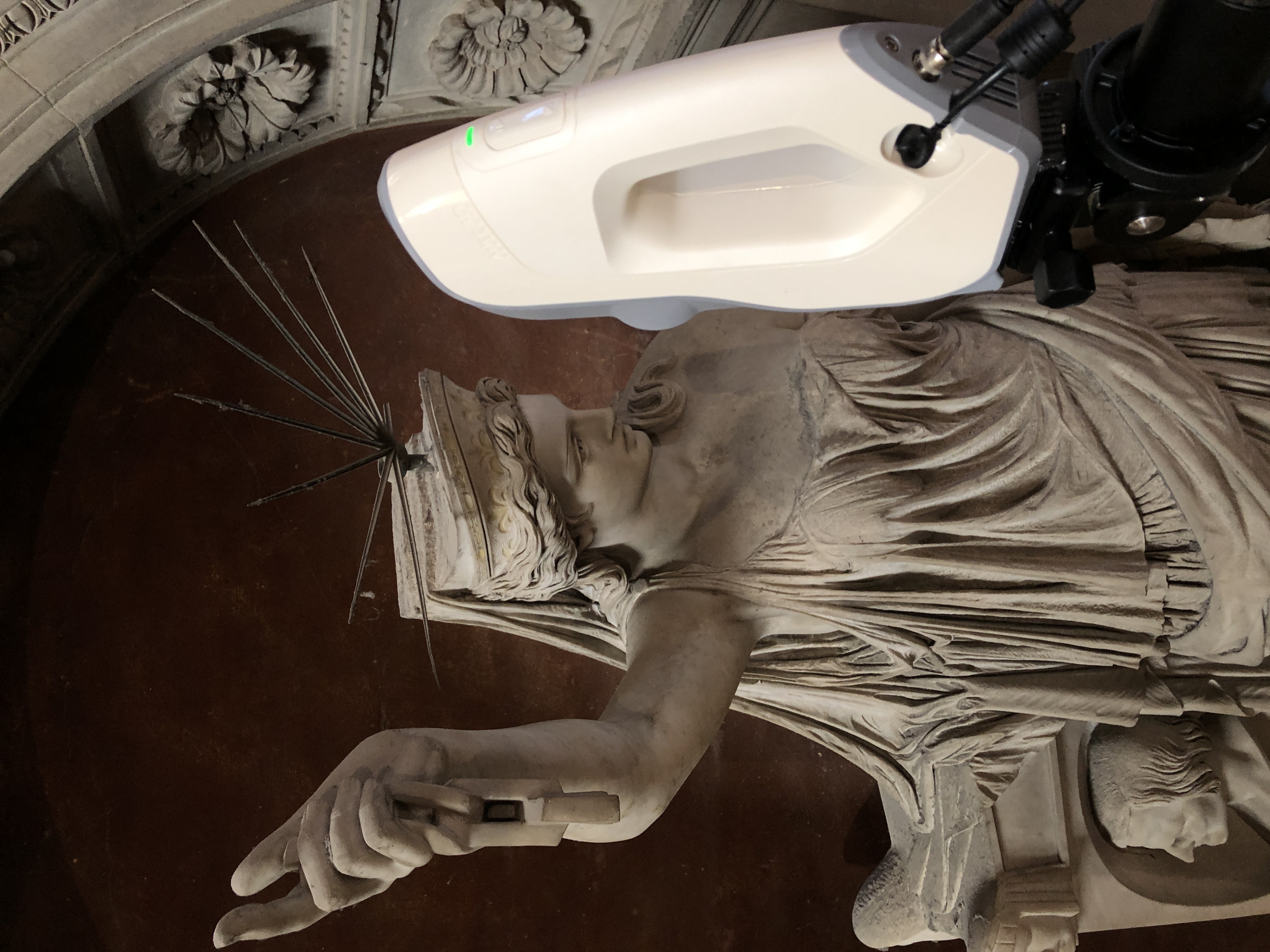 The Artec Eva scanner mounted on its carbon-fiber monopod rig